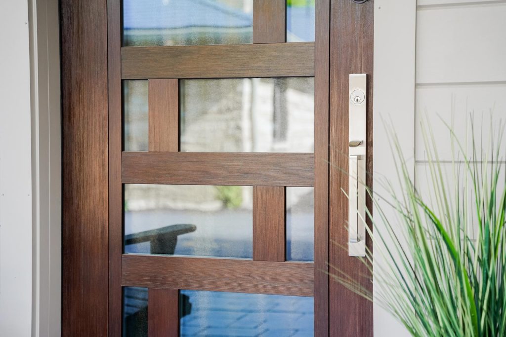 ProVia Signet fiberglass entry door, fir grain in Truffle stain